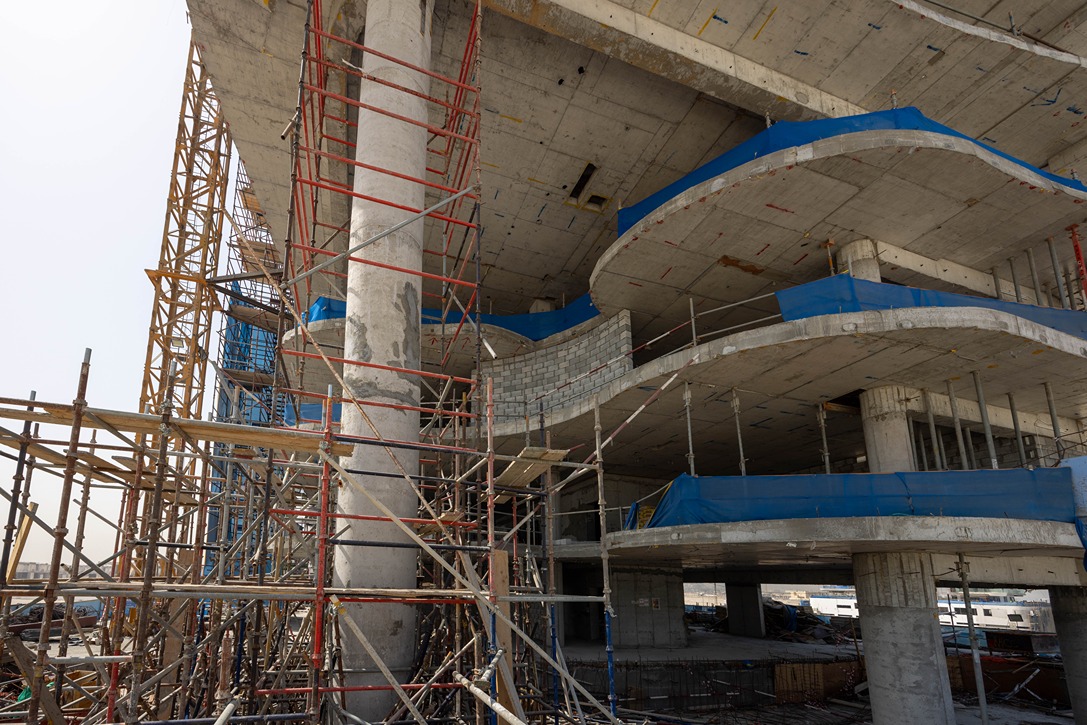 Beach Walk Iii By Imtiaz Construction site featuring scaffolding and concrete structures, showcasing ongoing building work and safety measures.