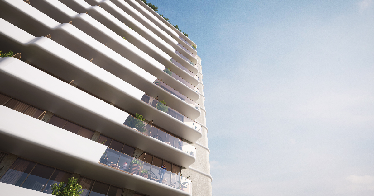 Pearl House Ii By Imtiaz Modern residential building with curved balconies, greenery, and a clear blue sky in the background.