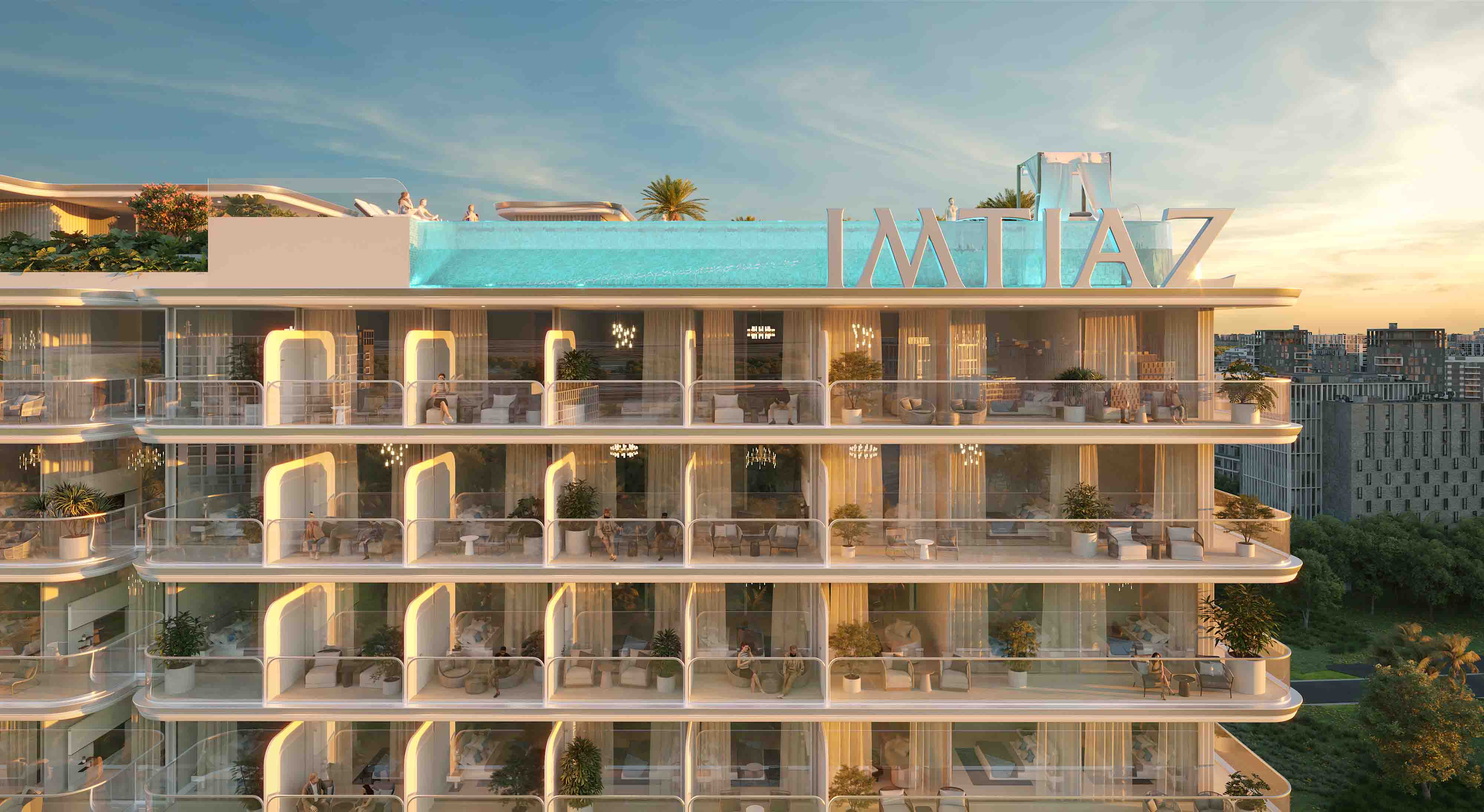 Cove Edition 6 By Imtiaz 1 A modern building with balconies, a rooftop pool, and greenery, featuring stylish architectural design at sunset.
