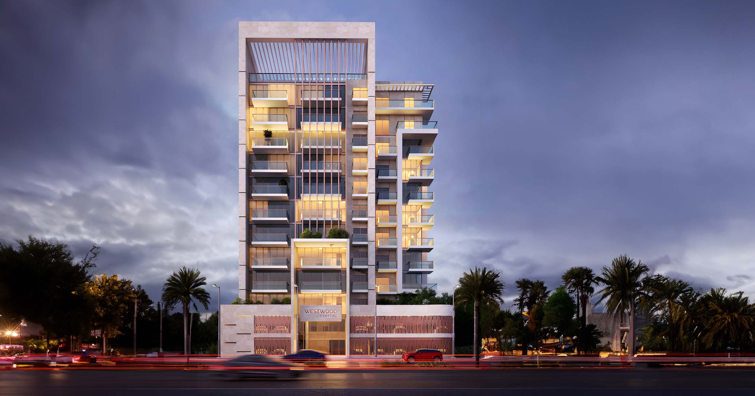Westwood By Imtiaz A modern residential building with multiple balconies, illuminated under a cloudy sky, surrounded by palm trees.