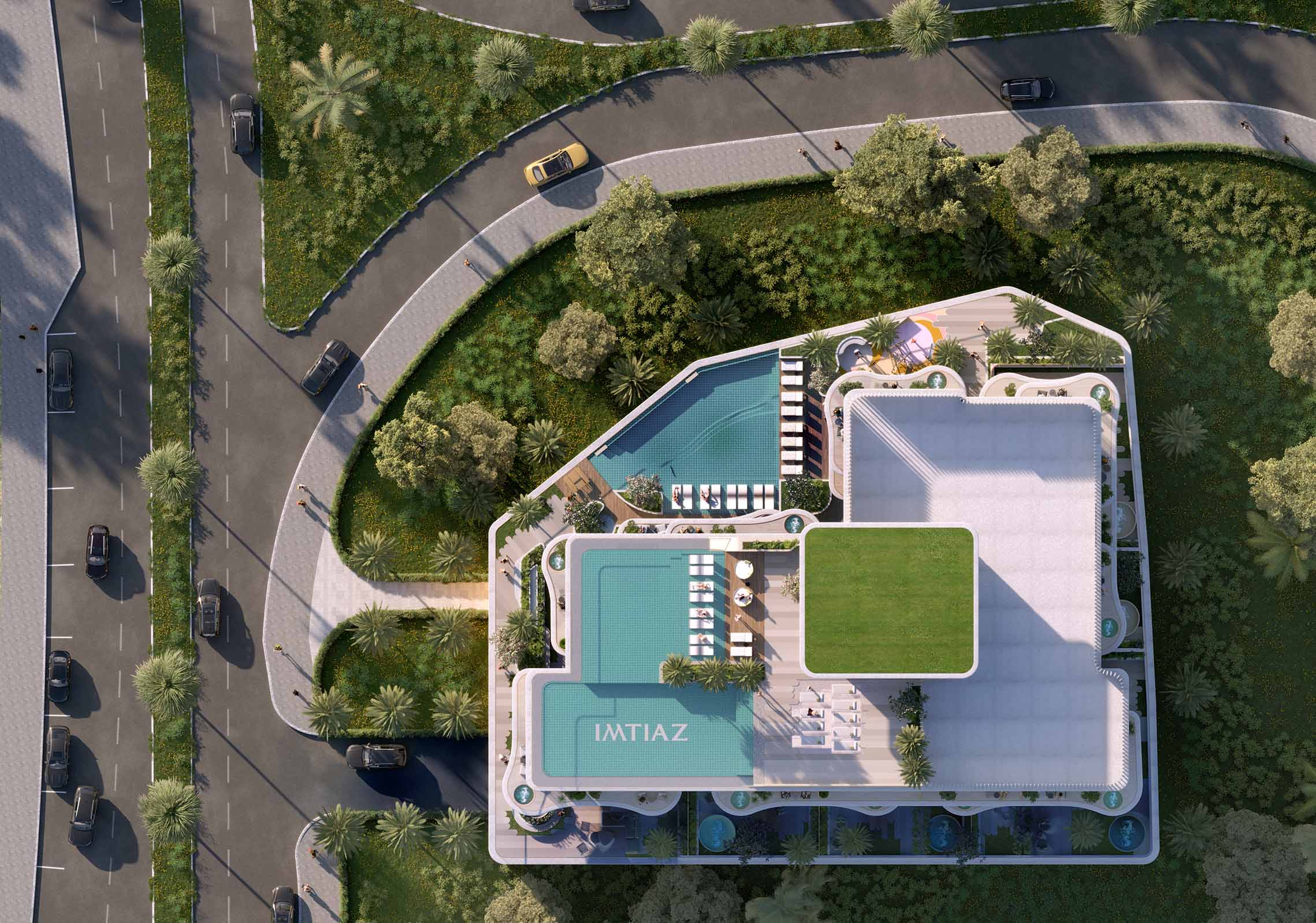 Beach Walk 4 By Imtiaz Aerial view of a modern building complex with pools, landscaped greenery, and surrounding roads.