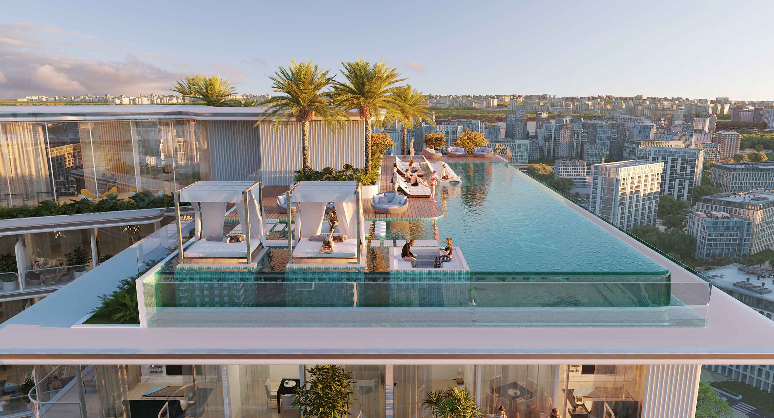 Cove Grand By Imtiaz A luxury rooftop pool with palm trees, lounge areas, and people relaxing against a city skyline backdrop.