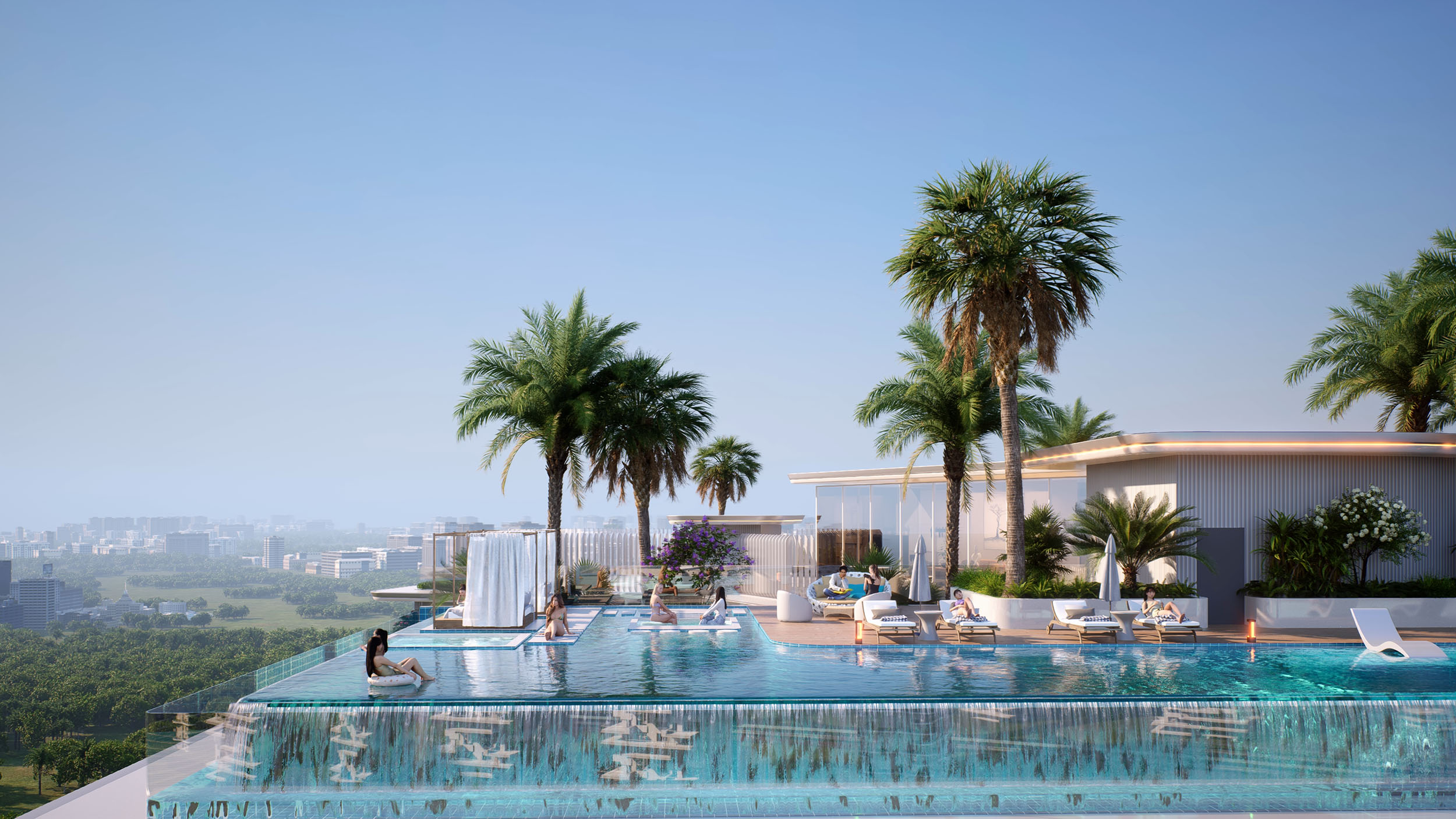 Cove Grand By Imtiaz A luxurious infinity pool with palm trees, lounging guests, and a scenic city view under a clear blue sky.