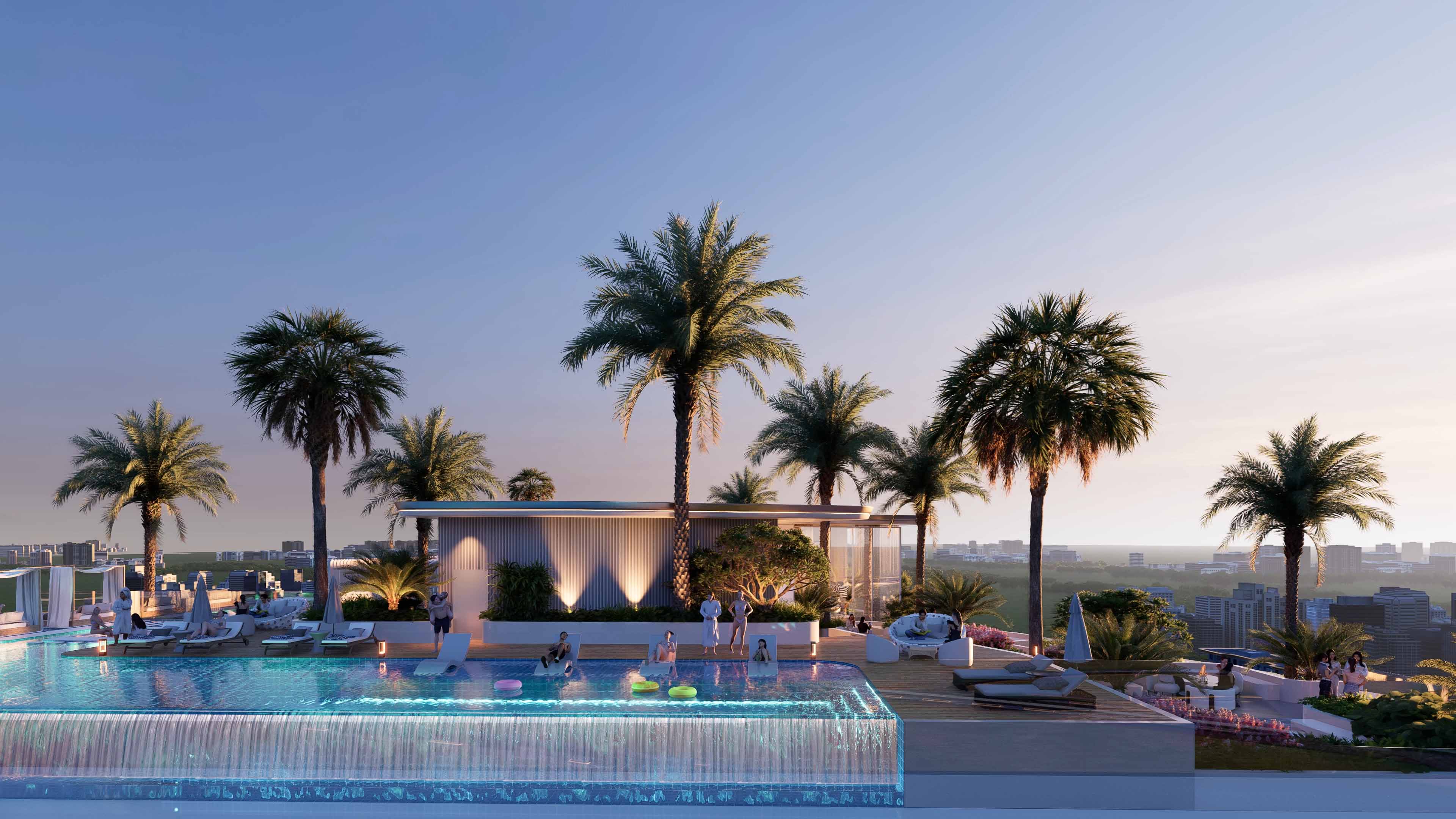 Cove Grand By Imtiaz A rooftop poolside scene with palm trees, loungers, and people enjoying the sunset in a luxurious setting.