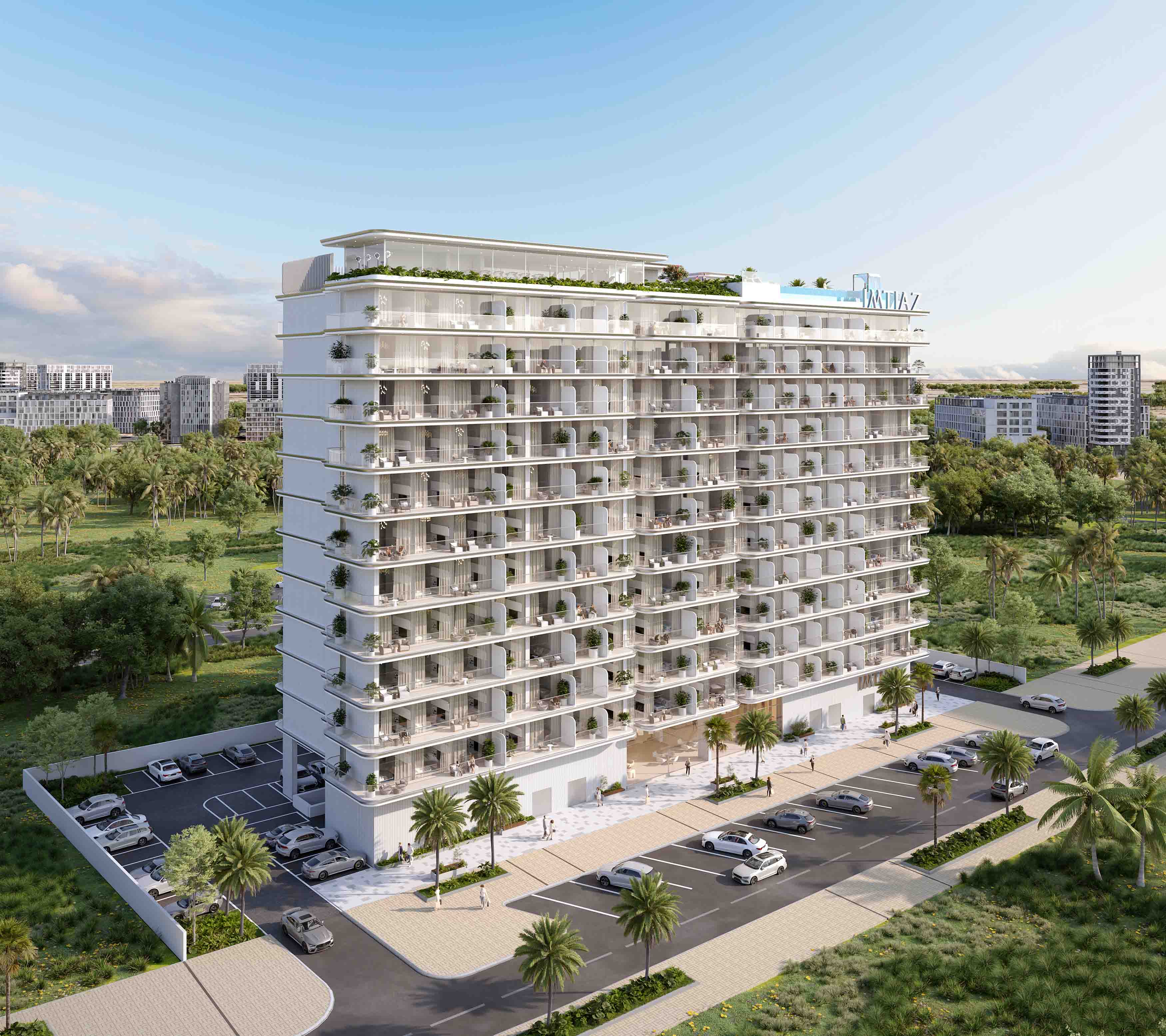 Cove Edition 6 By Imtiaz 1 A modern residential building with balconies, surrounded by greenery and a parking area, under a clear blue sky.