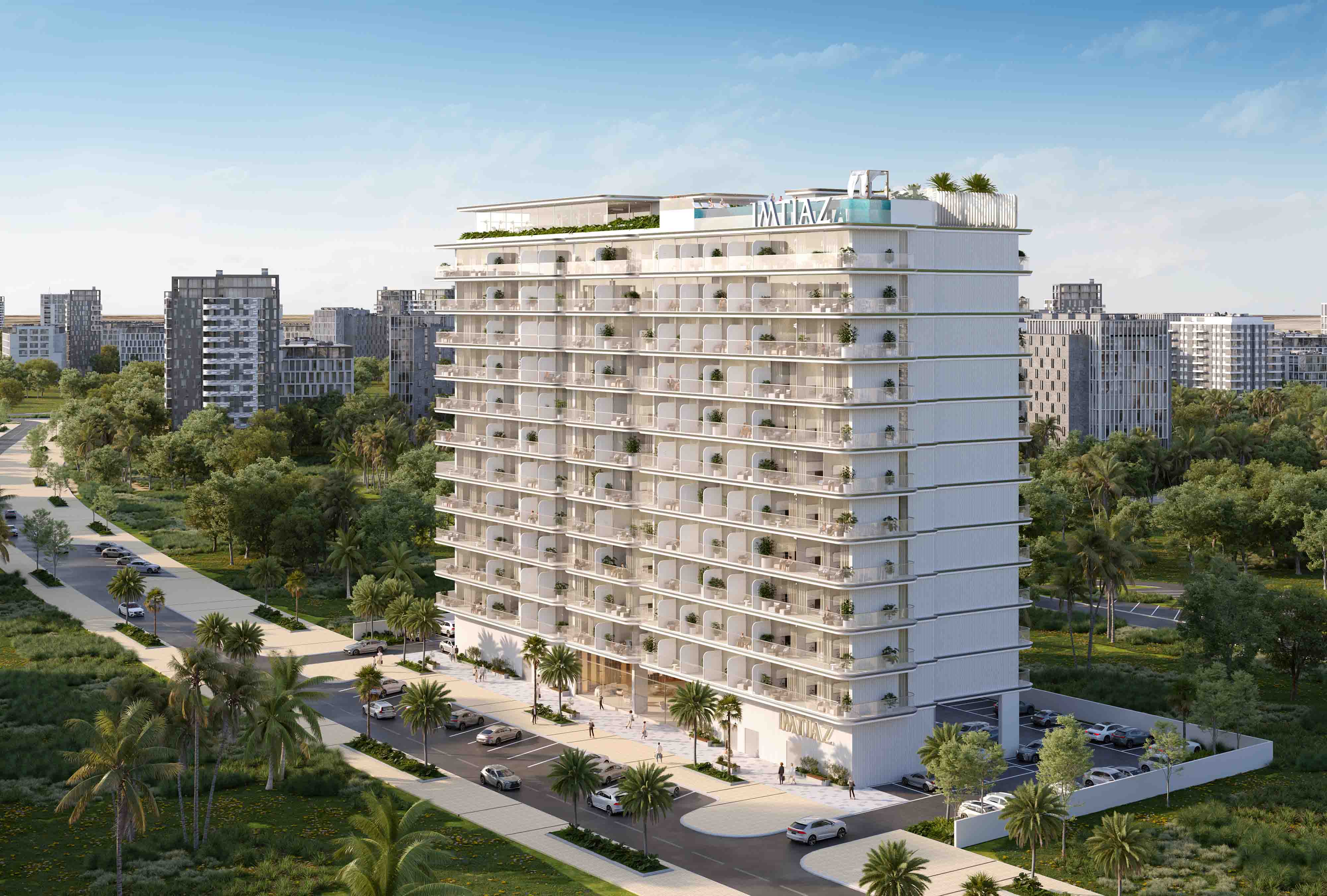 Cove Edition 6 By Imtiaz 1 A modern multi-story building surrounded by greenery, with balconies and palm trees lining the streets.