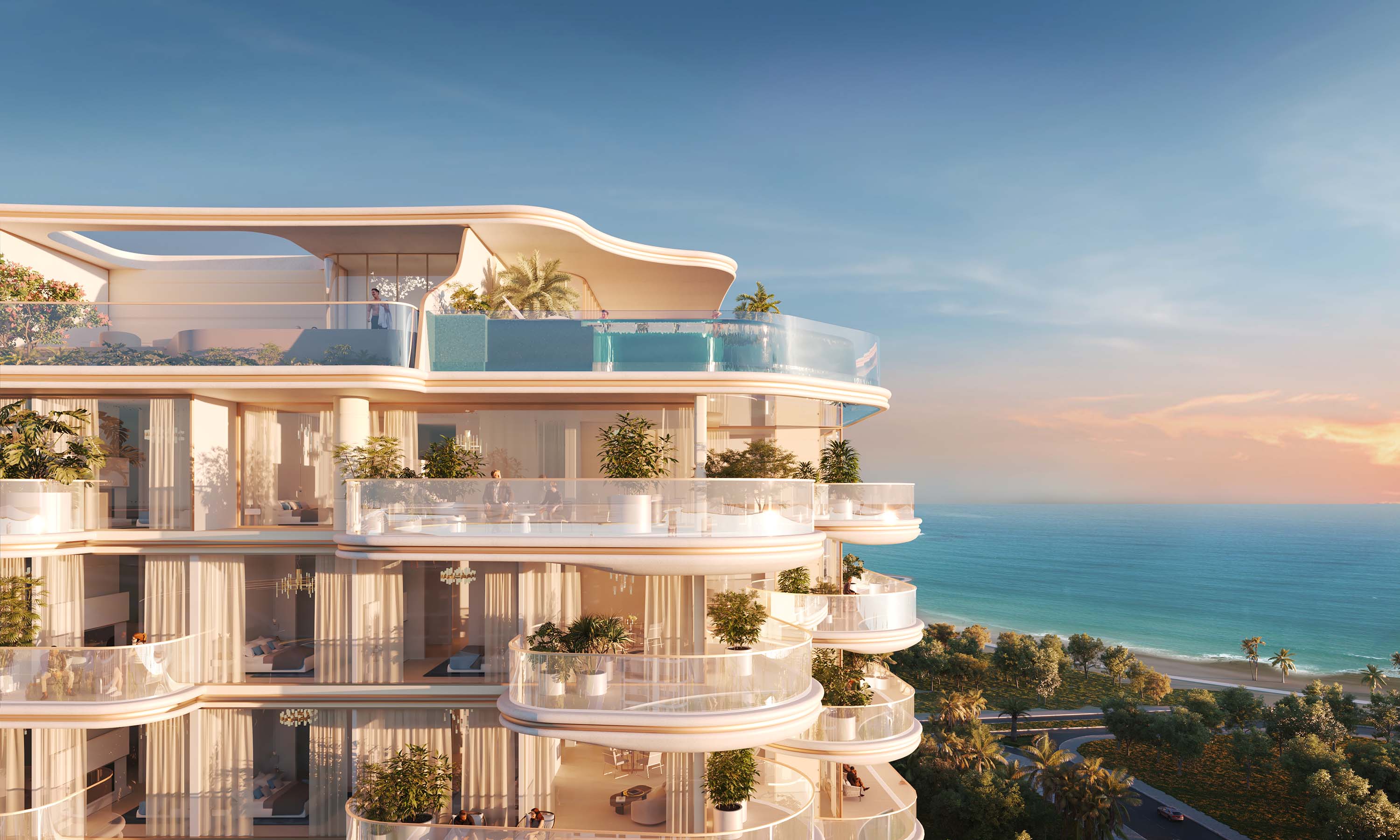 Beach Walk Grand 2 By Imtiaz A modern coastal building with curved balconies, lush greenery, and ocean views at sunset.