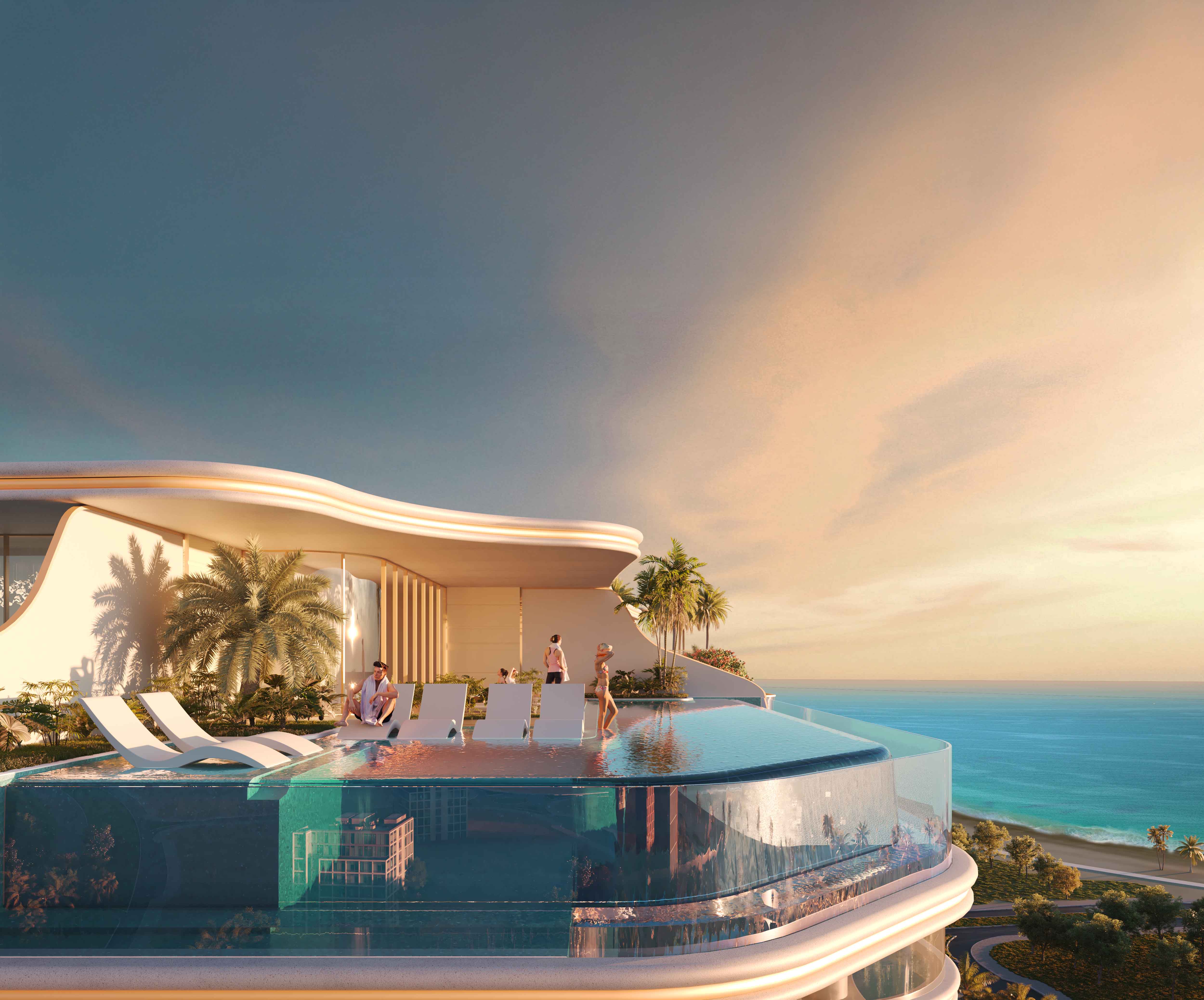 Beach Walk Grand 2 By Imtiaz A modern infinity pool on a luxury terrace, overlooking the ocean with lounge chairs and palm trees.