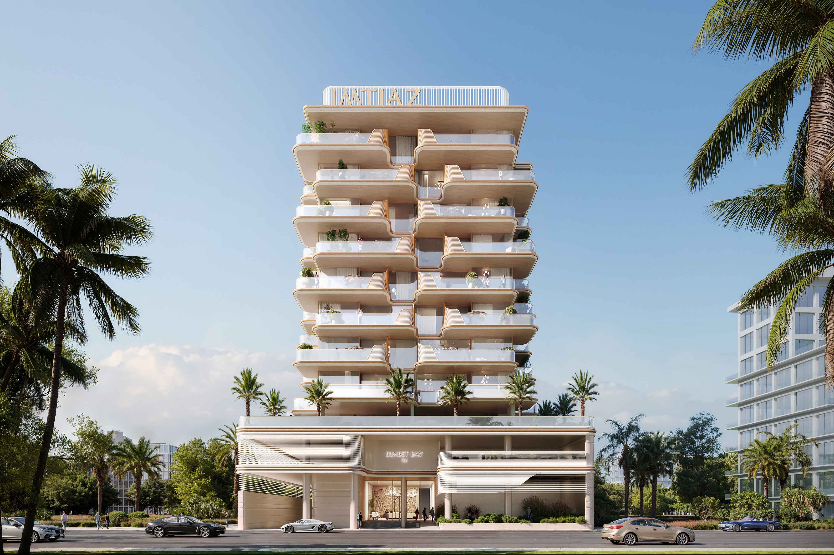 Sunset Bay 5 By Imtiaz A modern multi-story building with curved balconies, palm trees, and a sleek entrance under a clear blue sky.