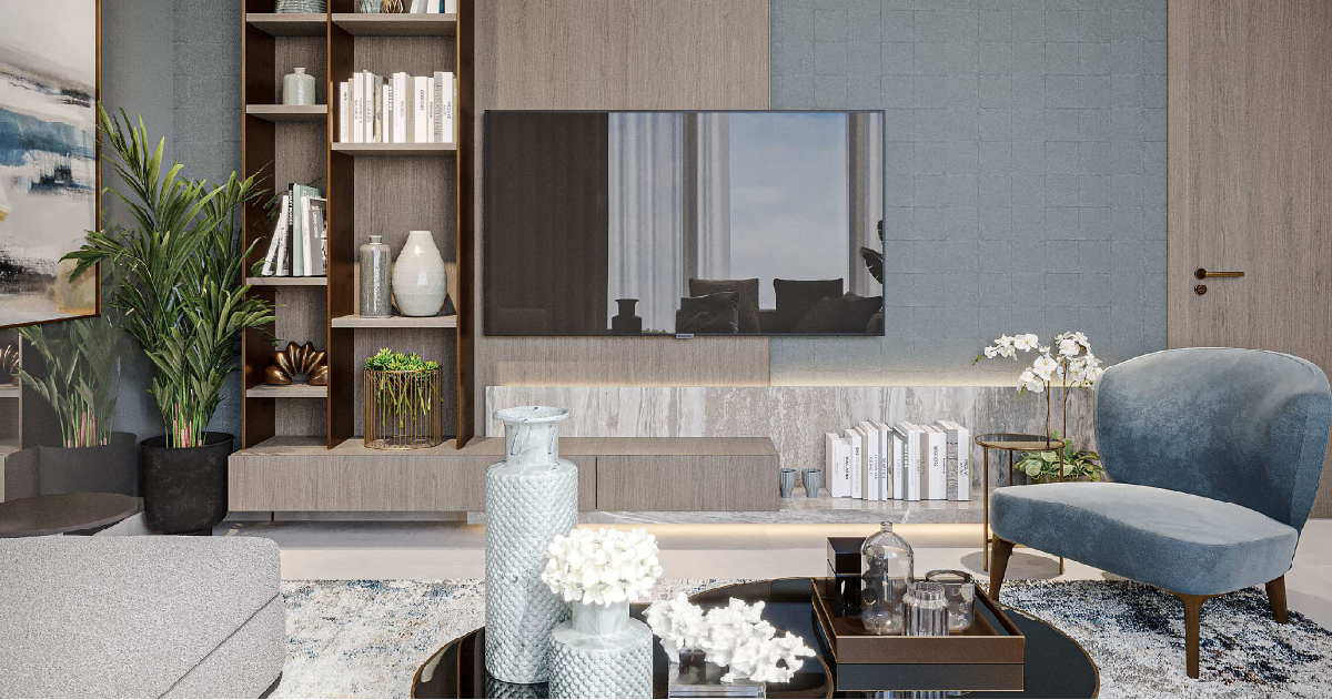 Westwood Grande By Imtiaz Modern living room featuring a blue chair, wooden shelves with books, plants, and a wall-mounted TV.