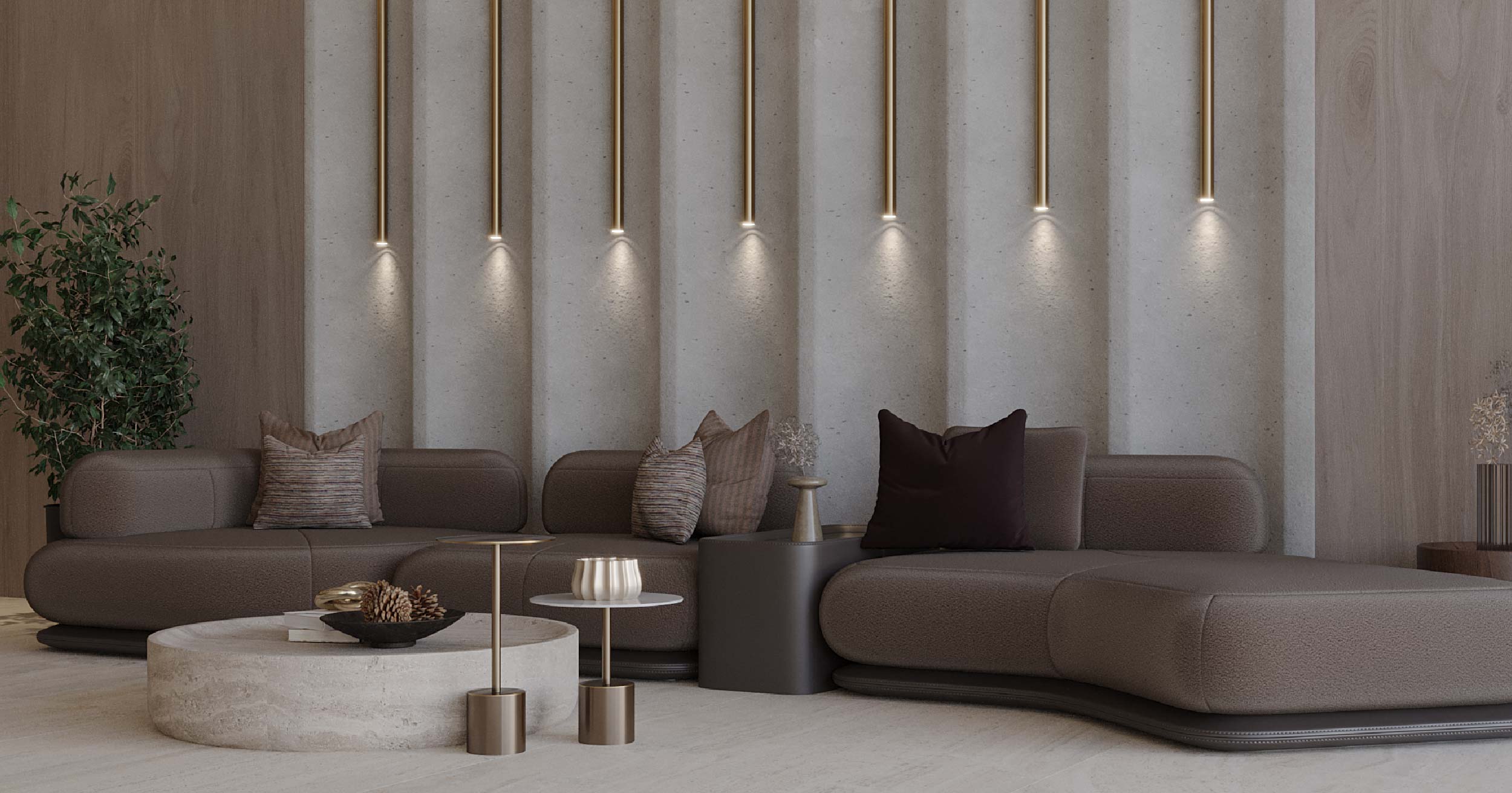 Pearl House Iii By Imtiaz A modern living room featuring a curved brown sofa, decorative pillows, a round coffee table, and wall lighting.