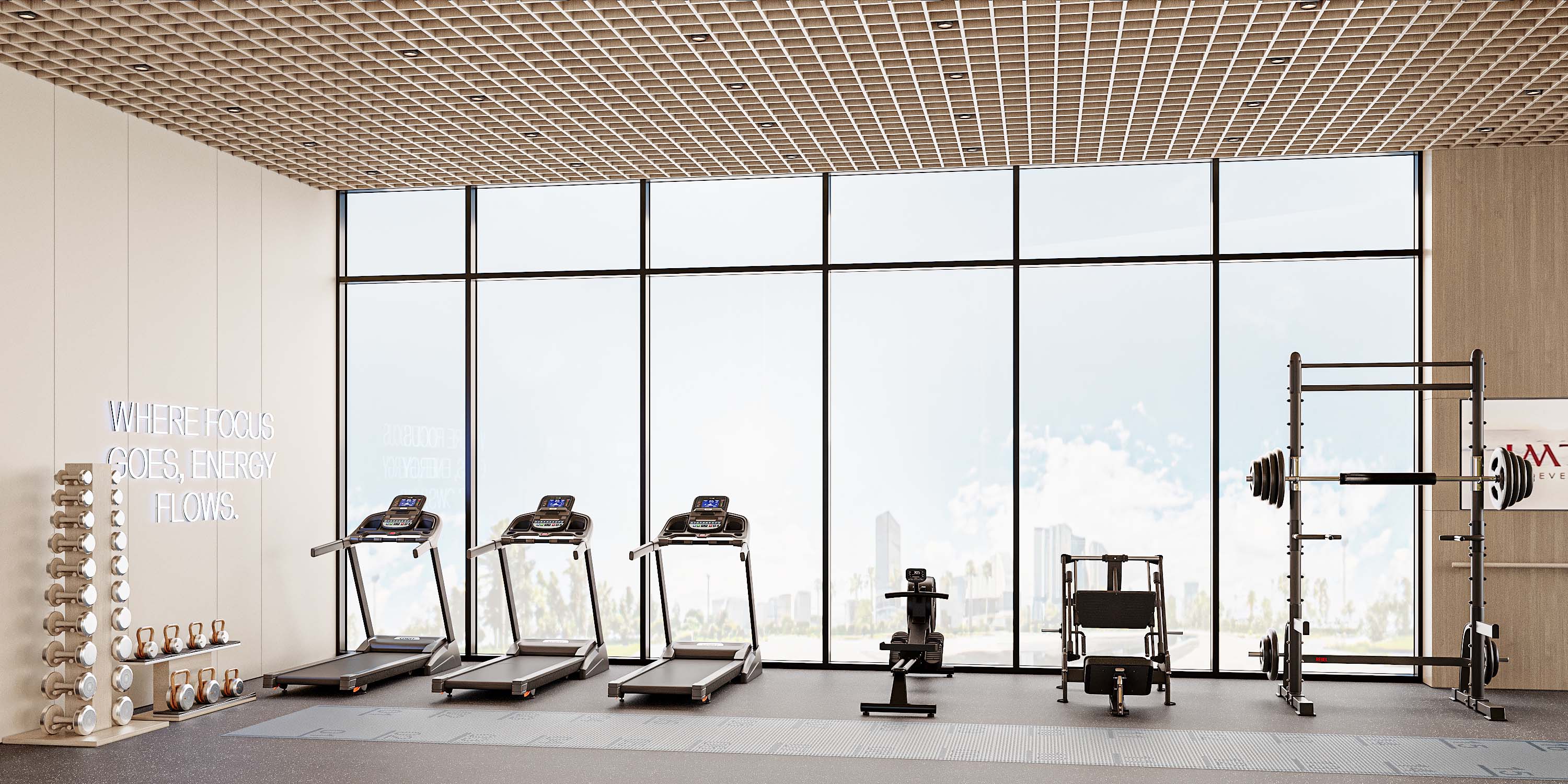 Cove Edition Iii By Imtiaz Modern gym interior featuring treadmills, weights, and fitness equipment by large windows with city views.