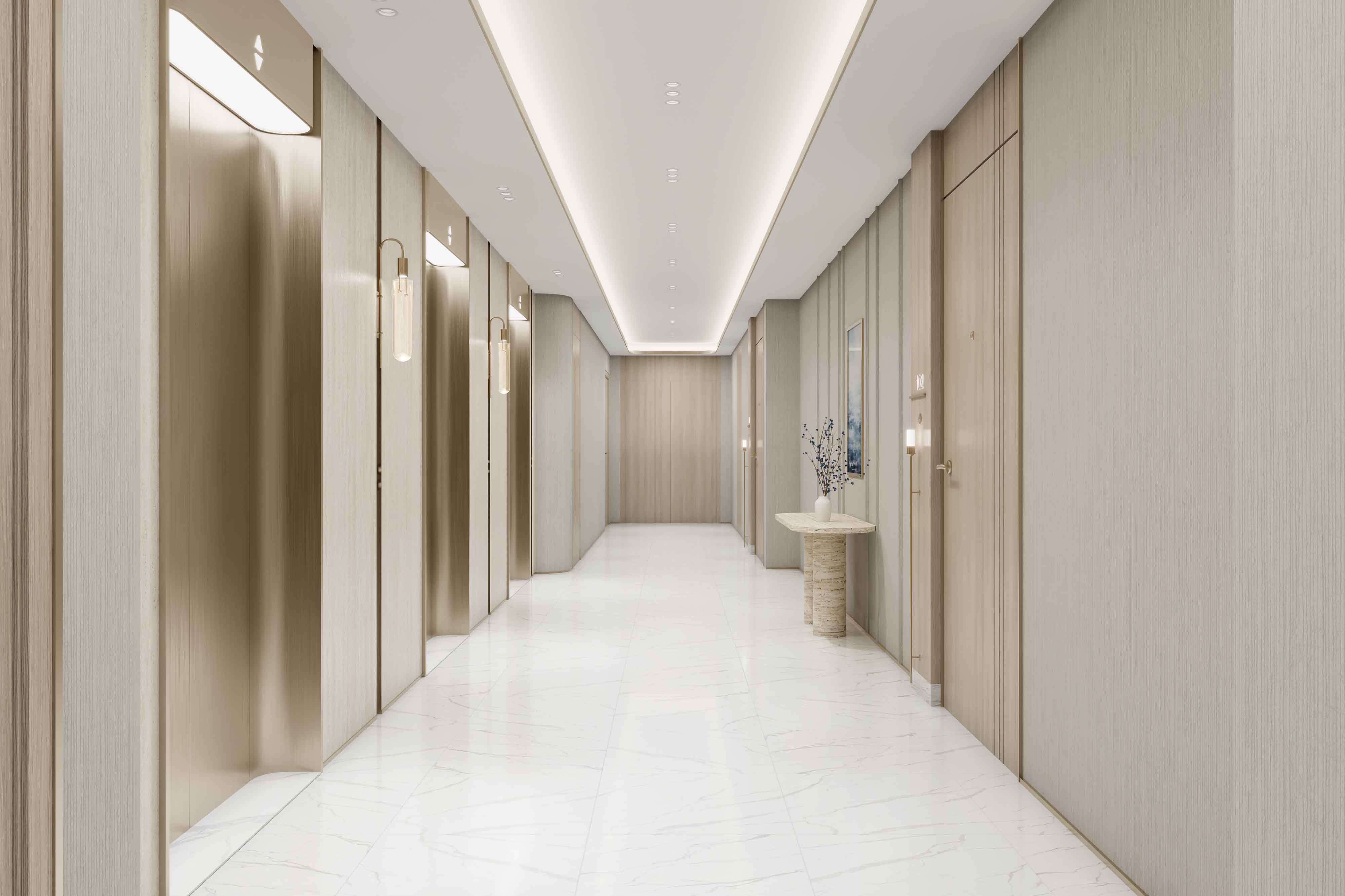 Beach Walk 4 By Imtiaz A modern hallway featuring elegant lighting, elevators, and a decorative table with a minimalist design.
