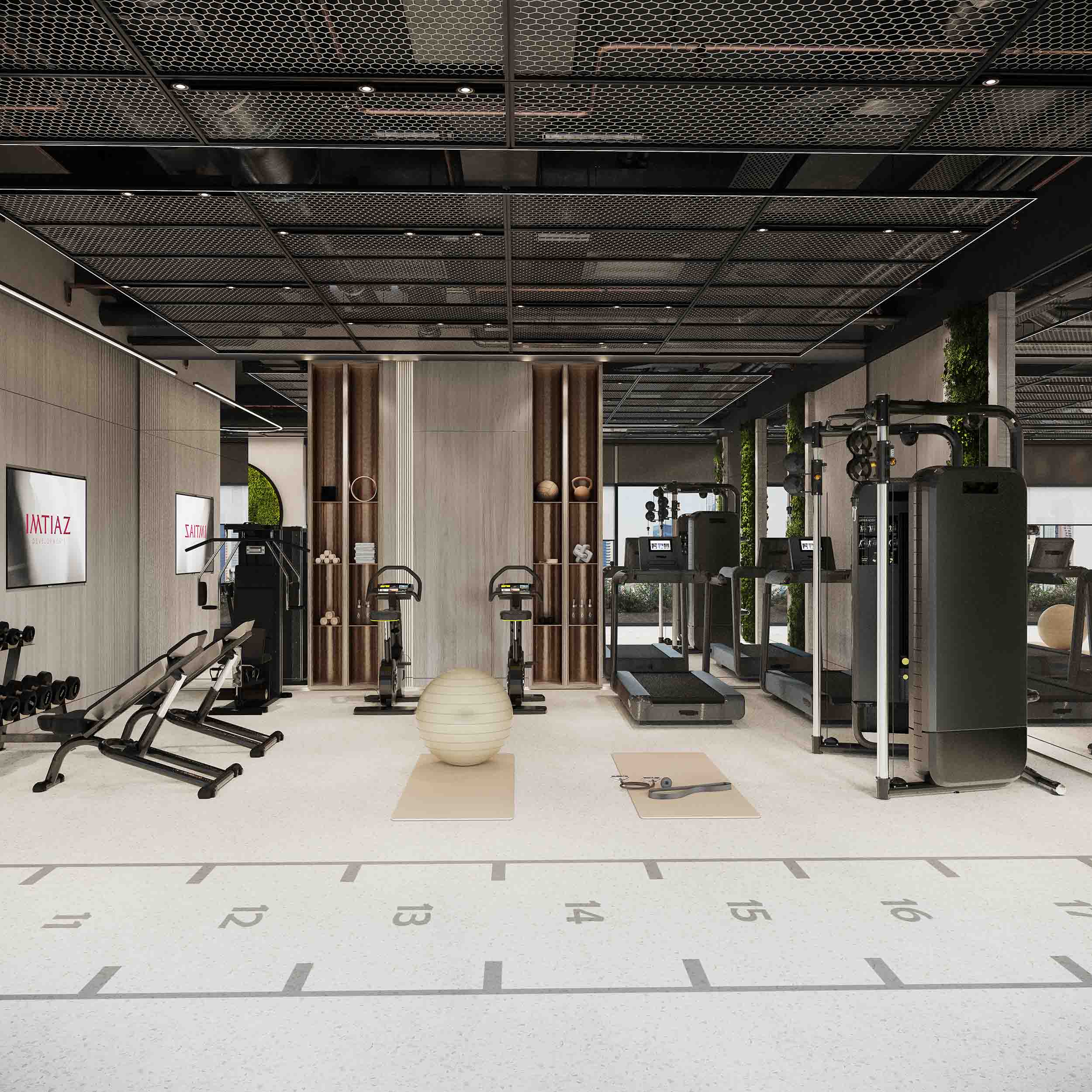 Pearl House 4 By Imtiaz A modern gym interior featuring workout equipment, exercise mats, and a fitness ball on a polished floor.