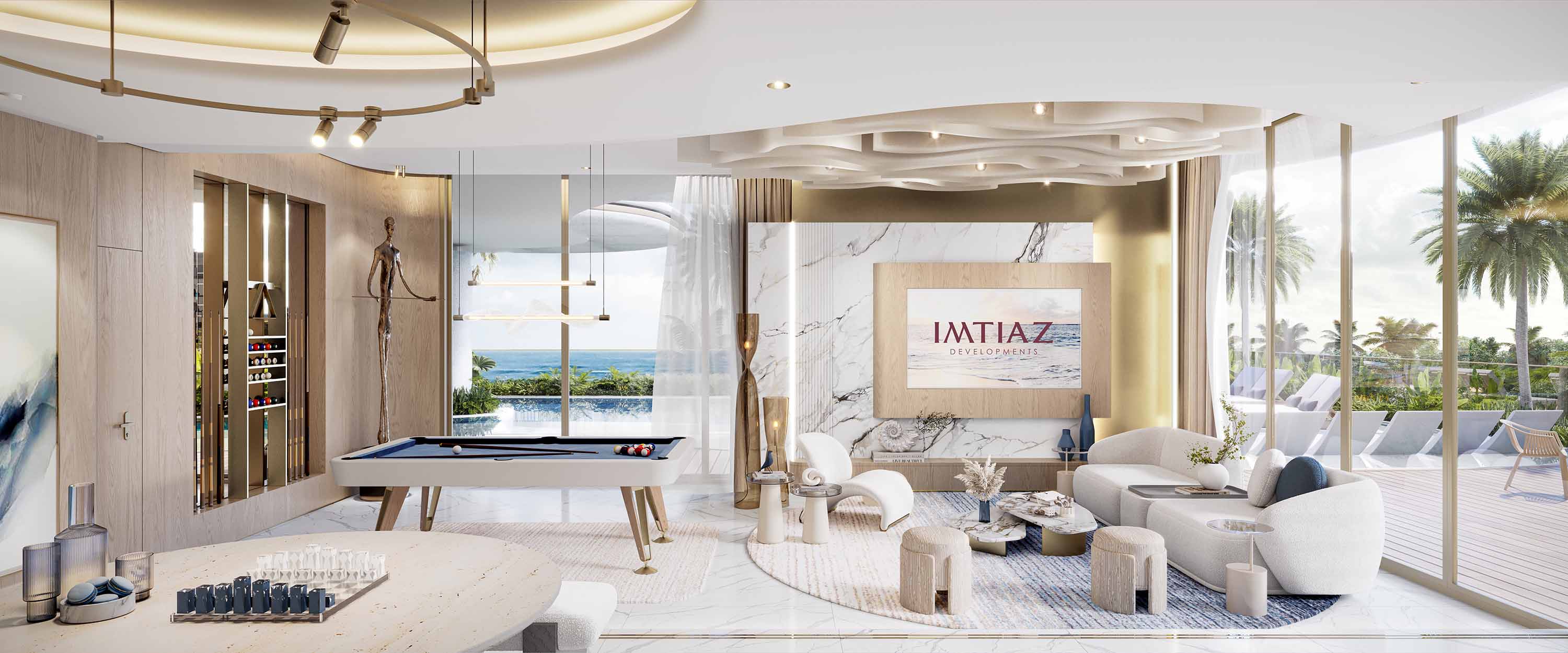 Sunset Bay 5 By Imtiaz A stylish living room featuring a pool table, modern furniture, and large windows with a sea view.