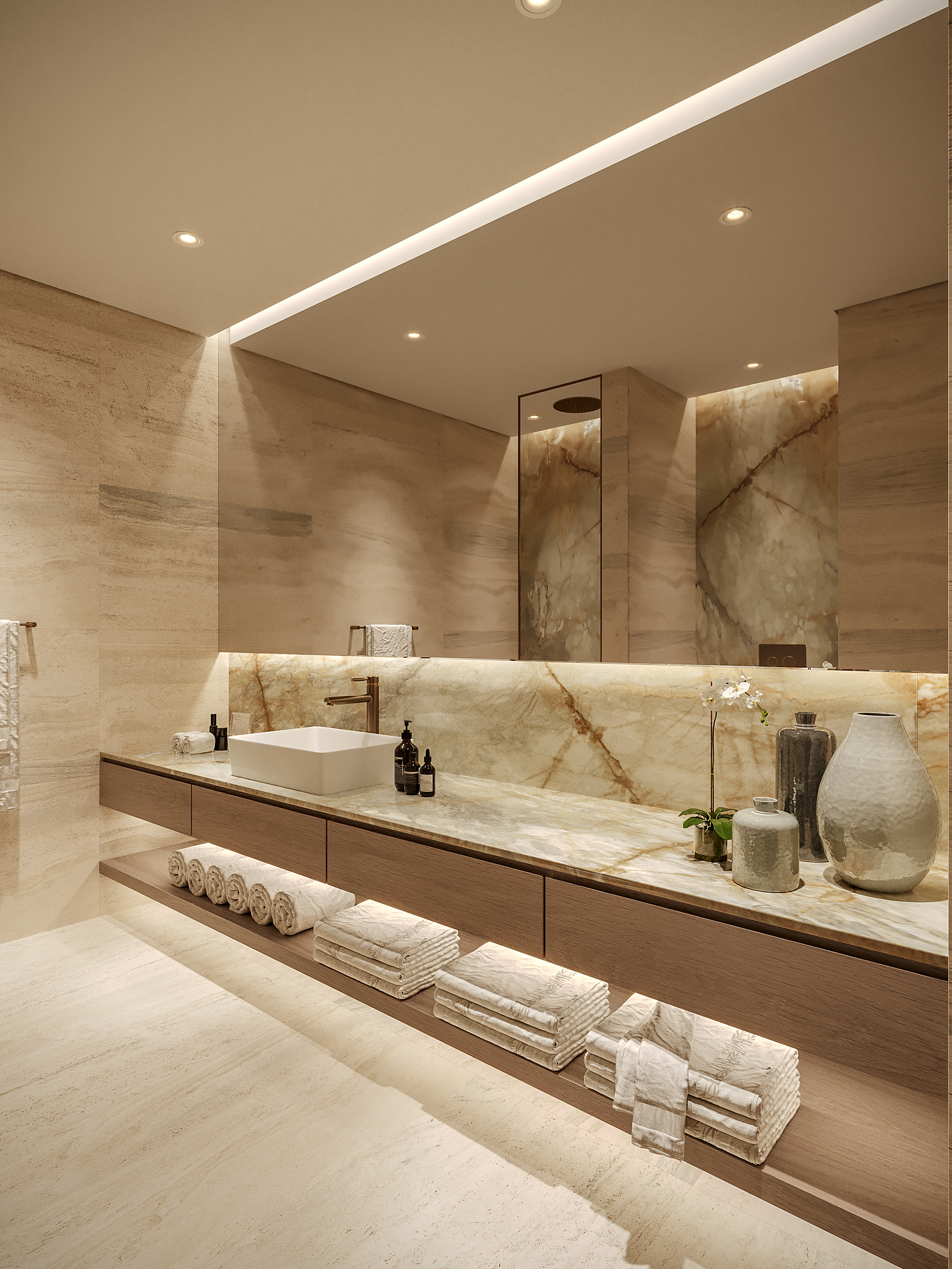 Pearl House Ii By Imtiaz Elegant bathroom featuring a marble sink, wooden cabinetry, decorative vases, and neatly folded towels.