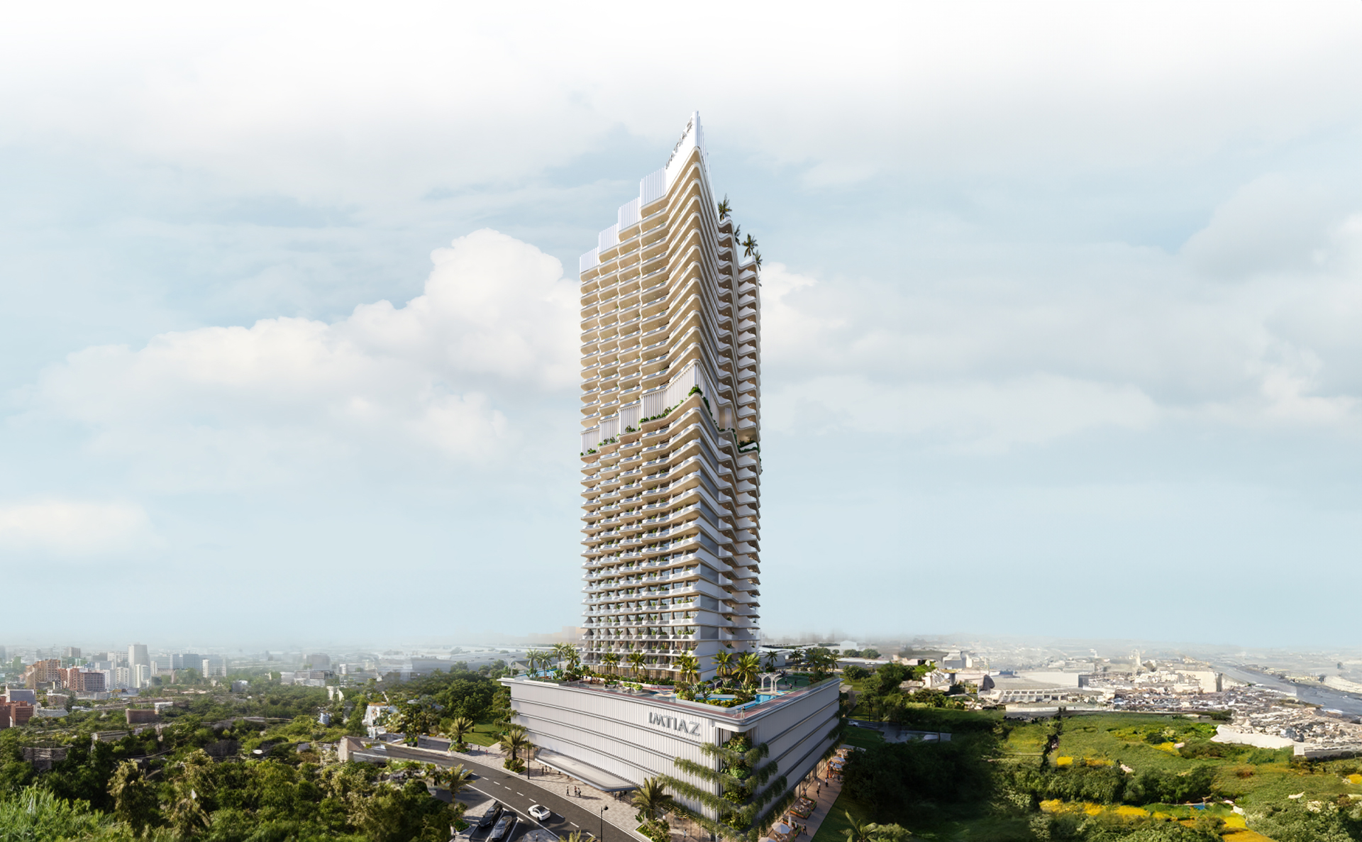 Properties A modern high-rise building with greenery, featuring balconies, set against a cloudy sky and urban landscape.